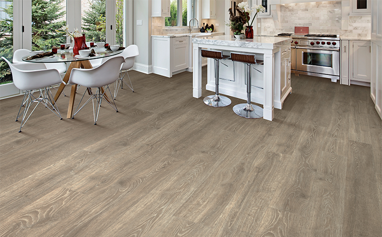 kitchen area with laminate light floors