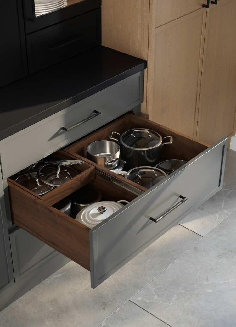 Gray pull out cabinet with built-in storage for pots and pans