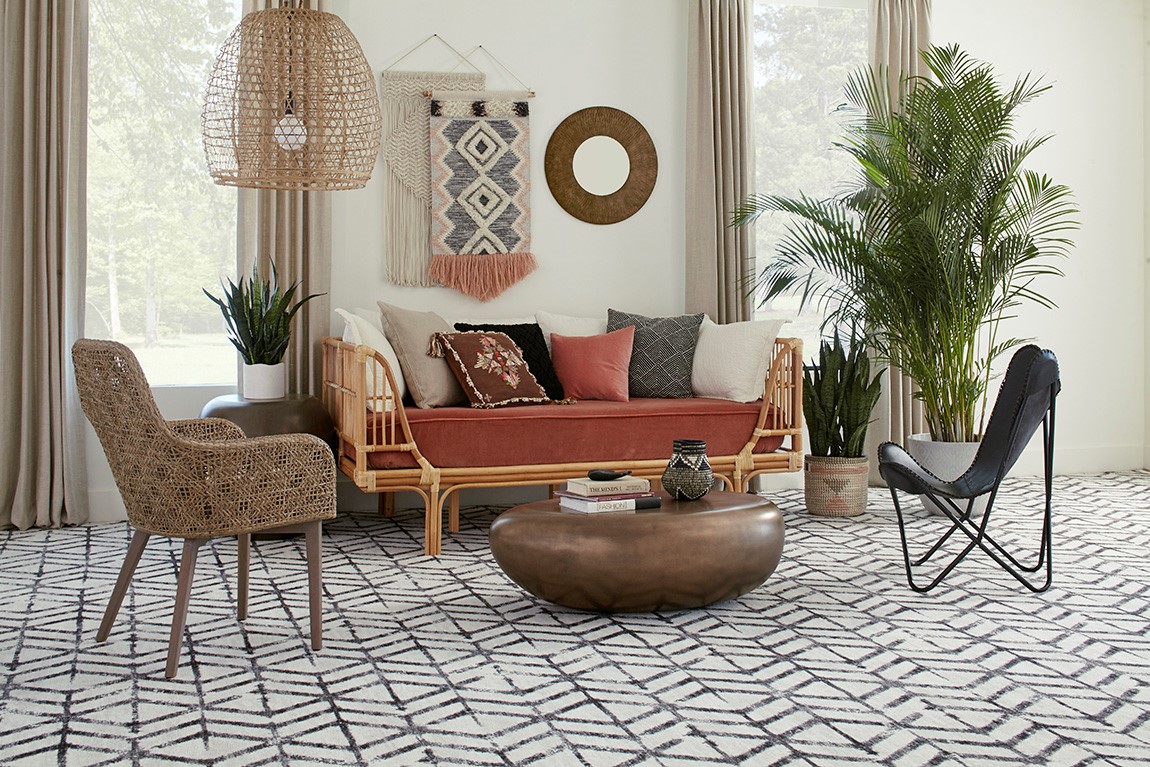 living room with patterned carpet flooring