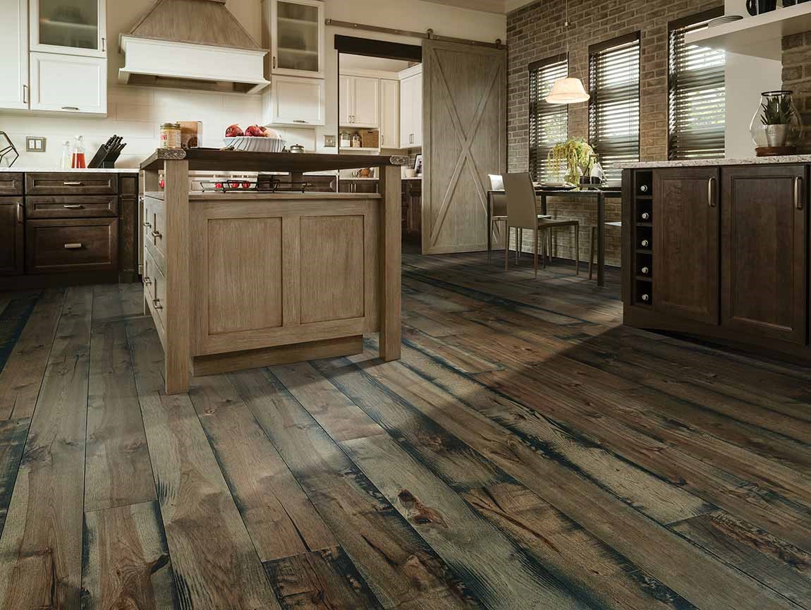 rustic pattern wood look flooring in barn style kitchen