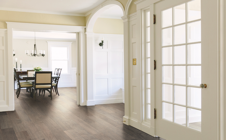 hardwood in white entryway hallways to dining room