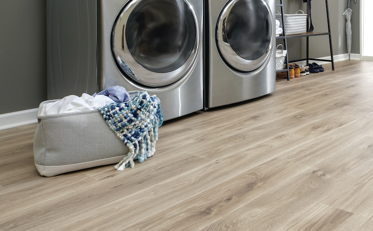 wood look laminate flooring in a laundry room