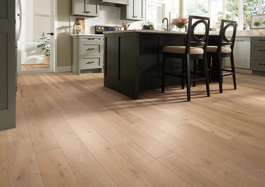 warm toned hardwood flooring in kitchen